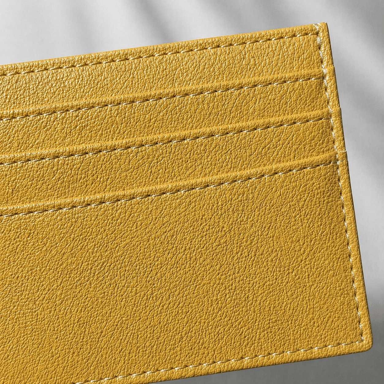 premium edge paint finish and 8-9 SPI stitching detail on wholesale slim card holders