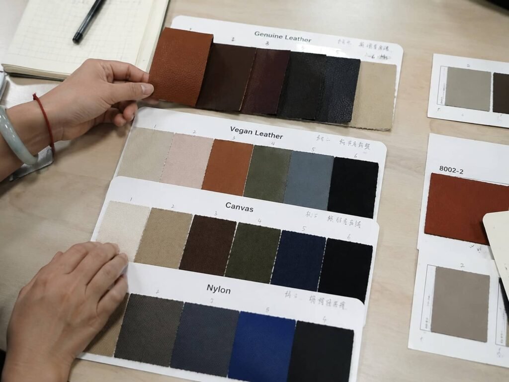 How Custom Makeup Bags Are Made: From Design Concept to Mass Production 2 custom makeup bag material selection leather vegan swatches comparison