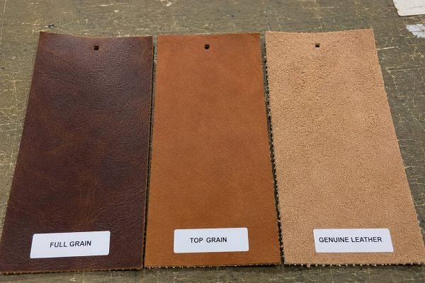 Full-grain, top-grain, and genuine leather swatches side by side